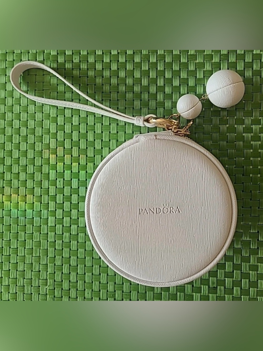 Pandora Cream Round Wristlet Pouch with Gold Accents